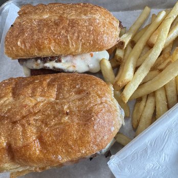 Caboose Commons - Chicken Parm sandwich with fries - Breweries Near Me - Fairfax, Virginia