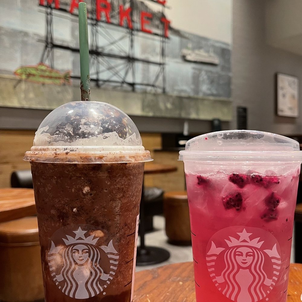 Starbucks - two drinks sitting on a table in a coffee shop - Coffee & Tea Near Me - Seattle, Washington Starbucks - two drinks sitting on a table in a coffee shop - Coffee & Tea Near Me - Seattle, Washington