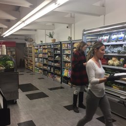 a woman walking through the store a woman walking through the store