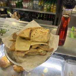 Bifana - pork sandwich with cheese , add chili oil and mustard