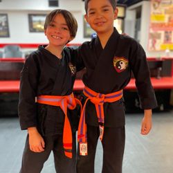 Power of One Self Defense Institute - Kids Karate, Kickboxing and jiujitsu in Long Beach !  Sweating, smiling and growing together !