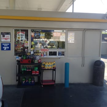 Valero - a car parked in front of a gas station - Gas Stations Near Me - Tracy, California
