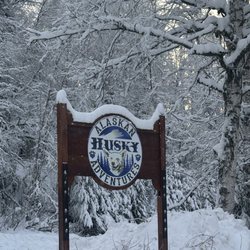 Alaskan Husky Adventures - Entrance sign