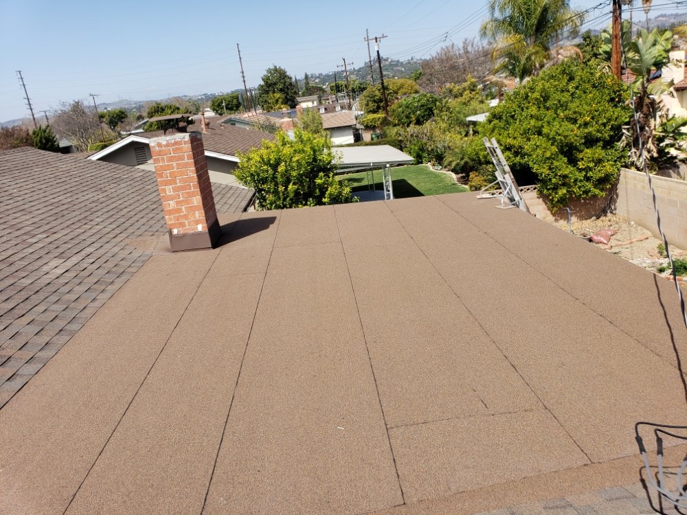 Slide of 2Gun Roofing & Waterproofing