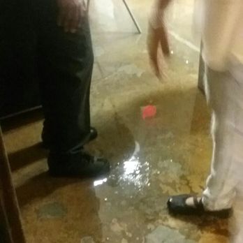 Roswell Historic Hall - Wet floor, again. It flooded like this all night. - Venues & Event Spaces Near Me - Roswell, Georgia