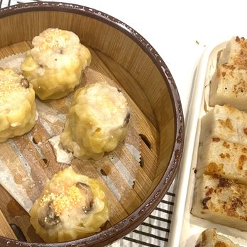 Yan Peninsula - Sui mai (left) and daikon cake (right). - Seafood Near Me - Millbrae, California Yan Peninsula - Sui mai (left) and daikon cake (right). - Seafood Near Me - Millbrae, California
