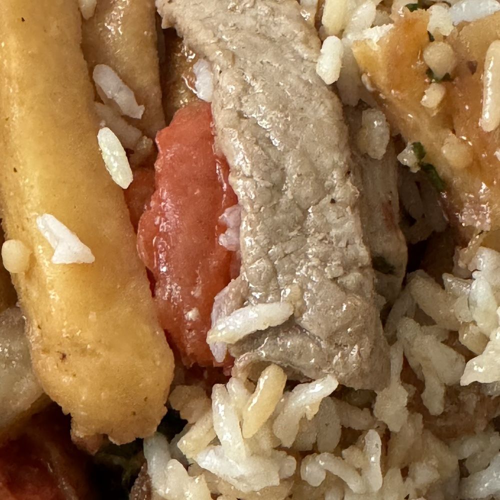 Con Sabor A Peru - Pale meat that looks like it wasn't seasoned or cooked with the sauce - Peruvian Near Me - Los Angeles, California Con Sabor A Peru - Pale meat that looks like it wasn't seasoned or cooked with the sauce - Peruvian Near Me - Los Angeles, California