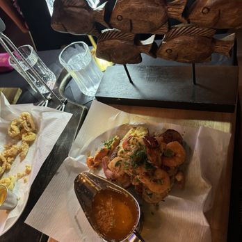 Deluxe Fun Dining - Seafood baked potatoes - Bars Near Me - Charlotte, North Carolina Deluxe Fun Dining - Seafood baked potatoes - Bars Near Me - Charlotte, North Carolina