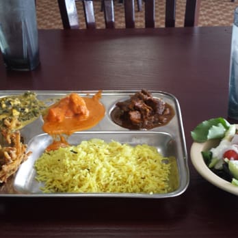 Saffron - Austin - Saag paneer, goat curry, butter chicken, rice, salad. - Indian Near Me - Austin, Texas Saffron - Austin - Saag paneer, goat curry, butter chicken, rice, salad. - Indian Near Me - Austin, Texas