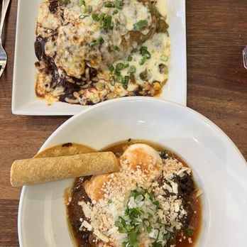 Cafe Pasqual's - Smothered burrito w Xmas chile & barbacoa w poached eggs ....all stellar - Vegetarian Near Me - Santa Fe, New Mexico