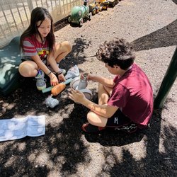 Montessori In Town - Upper elementary children donating and building a balance bike for the toddler community