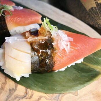 iPho Sushi Kitchen & Bar - Sushi Chef Sanny's creation: an array of endless surf Clam nigiri - Sushi Bars Near Me - Knightdale, North Carolina iPho Sushi Kitchen & Bar - Sushi Chef Sanny's creation: an array of endless surf Clam nigiri - Sushi Bars Near Me - Knightdale, North Carolina