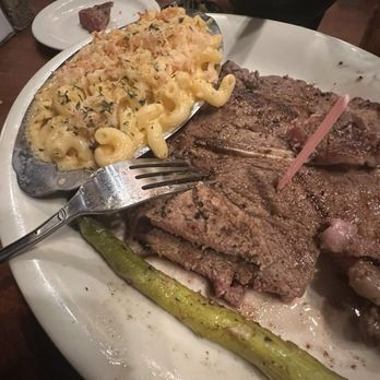 Cool Hand Luke's - The porterhouse steak with the lobster mac & cheese. You can see that the steak is thinner than the piece of asparagus. Very disappointing. - Steakhouses Near Me - Yuba City, California