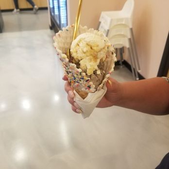 Gold Spoon Creamery - Cookies & Cream and Saint Looey Gooey in a white chocolate waffle cone - Ice Cream & Frozen Yogurt Near Me - Blue Ash, Ohio Gold Spoon Creamery - Cookies & Cream and Saint Looey Gooey in a white chocolate waffle cone - Ice Cream & Frozen Yogurt Near Me - Blue Ash, Ohio