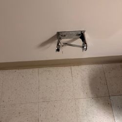 Island Lake Center - Damaged or missing wall-mounted fixture observed inside the resident room during my visit. The condition raised concerns regarding room main