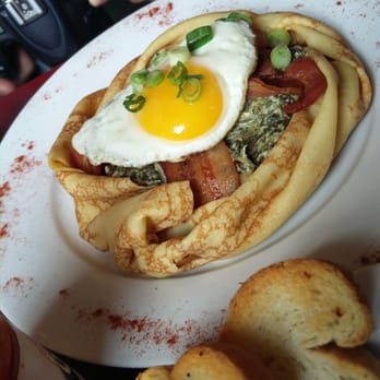 Cafe Conti - Friend got the spinach crepe. It's so cute! - Breakfast & Brunch Near Me - New Orleans, Louisiana Cafe Conti - Friend got the spinach crepe. It's so cute! - Breakfast & Brunch Near Me - New Orleans, Louisiana