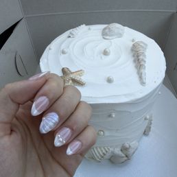 Seashell themed nails Seashell themed nails