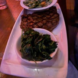Ribeye with 2 sides. (Caesar salad and sautéed spinach) Ribeye with 2 sides. (Caesar salad and sautéed spinach)