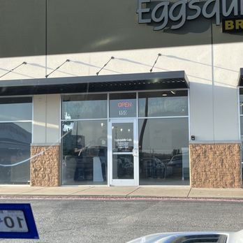 Eggsquisite Cafe - Entry door with hours of operation - Breakfast & Brunch Near Me - Sherman, Texas