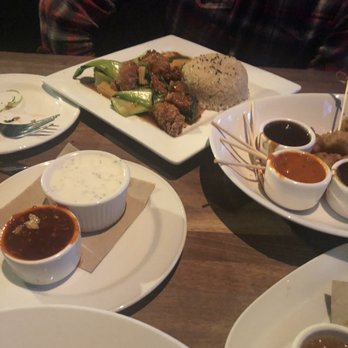 Yard House - Lots of sauce - Orange chicken Gardenia bites appetizer (vegetarian). - Bars Near Me - Raleigh, North Carolina Yard House - Lots of sauce - Orange chicken Gardenia bites appetizer (vegetarian). - Bars Near Me - Raleigh, North Carolina