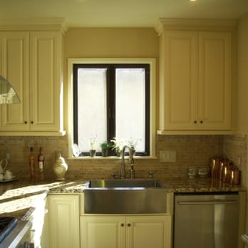 AMT Construction - a kitchen with a sink and stove - General Contractors Near Me - Belmont, California AMT Construction - a kitchen with a sink and stove - General Contractors Near Me - Belmont, California