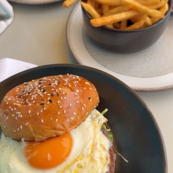 Let’s Yolk About It - Breakfast burger, fries, and breakfast burrito with vegan sausage. - Breakfast & Brunch Near Me - Long Beach, California Let’s Yolk About It - Breakfast burger, fries, and breakfast burrito with vegan sausage. - Breakfast & Brunch Near Me - Long Beach, California