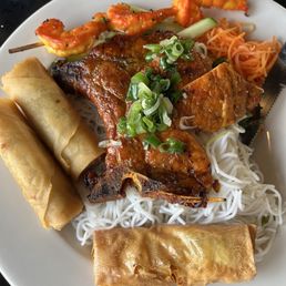 Pork cutlet with vermicelli noodle. 23 dollars for this plate. The one shrimp cake at the bottom was 5 dollars. Pork cutlet with vermicelli noodle. 23 dollars for this plate. The one shrimp cake at the bottom was 5 dollars.