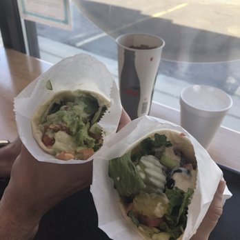 Wriggles - Two vegetarian wraps, one with tahini sauce and the other with cilantro lime sauce. - Delis Near Me - Murray, Utah