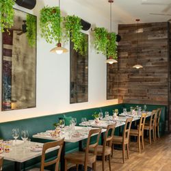 Casaro Osteria - Our dining room with green banquettes