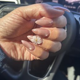 Wanted to try something new today and Megan came through with the cateye gel. Great job as always and Henry is on point with the pedi.