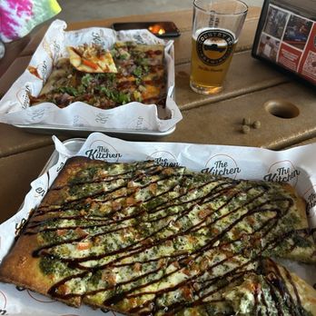 Country Boy Brewery - Margherita flatbread (foreground); smokehouse BBQ with pulled pork - Breweries Near Me - Georgetown, Kentucky Country Boy Brewery - Margherita flatbread (foreground); smokehouse BBQ with pulled pork - Breweries Near Me - Georgetown, Kentucky