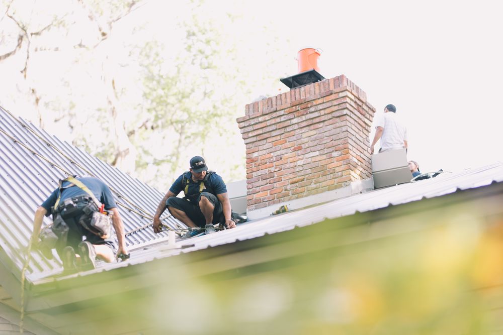 Slide of Tadlock Roofing