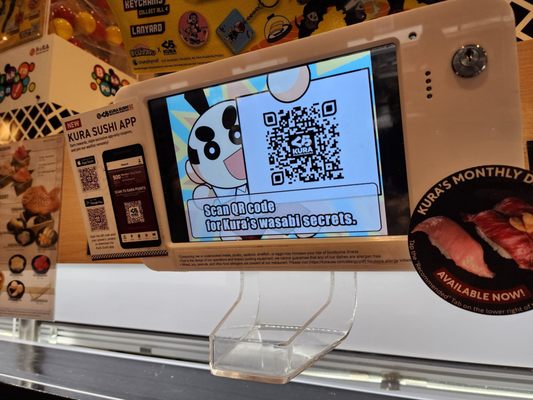 Kura Revolving Sushi Bar by null