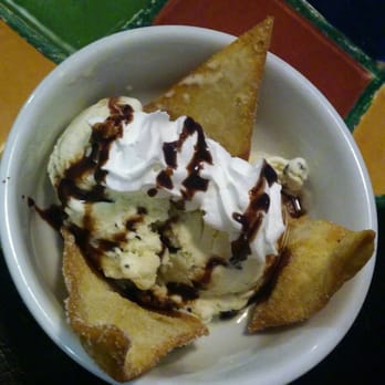 La Casita Olvera - Kids meal dessert- sundae with chocolate chip ice cream, topped with whipped cream and a chocolate drizzle, and a side of bunuelo chips. - Mexican Near Me - Whittier, California