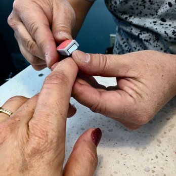 DJ Nails - Dan is using a magnet on the new cat eye nail gel. - Nail Technicians Near Me - Pasadena, California DJ Nails - Dan is using a magnet on the new cat eye nail gel. - Nail Technicians Near Me - Pasadena, California
