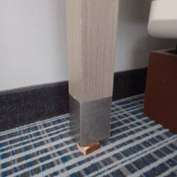 Courtyard by Marriott Long Island Islip/Courthouse Complex - Wood wedges under furniture - Hotels Near Me - Central Islip, New York Courtyard by Marriott Long Island Islip/Courthouse Complex - Wood wedges under furniture - Hotels Near Me - Central Islip, New York