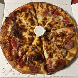 Linda's Pizza - Medium pepperoni pizza cooked well done