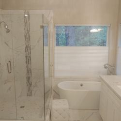 Premier Floor Covering - Carrera tile sold by Premier! New master bathroom.