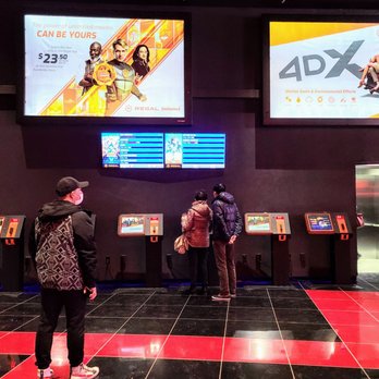 Regal Tangram - Upon entering/going up the escalator - Cinema Near Me - Flushing, New York Regal Tangram - Upon entering/going up the escalator - Cinema Near Me - Flushing, New York