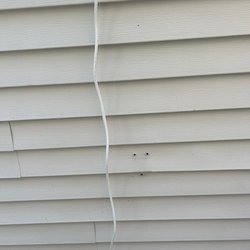 Bristol Aluminum Window & Siding Company - Picture of unplugged holes and power cable.