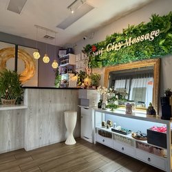 Surf City Massage - Front desk, tea, treats and other massage items.