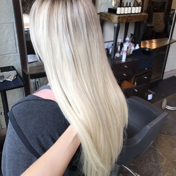 Carly Elliott Hair - Rooted blonde with a full head of non-damaging extensions. Tape in extensions are a great way to add length and fullness to your hair! - Hair Stylists Near Me - Folsom, California Carly Elliott Hair - Rooted blonde with a full head of non-damaging extensions. Tape in extensions are a great way to add length and fullness to your hair! - Hair Stylists Near Me - Folsom, California