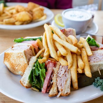 Putnam's Waterview Restaurant - Turkey Club sandwich with fries - American Near Me - Goffstown, New Hampshire