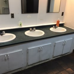 Husky House Restaurant - Their disgusting bathroom. The soap bottle with no pump on it is extra classy.