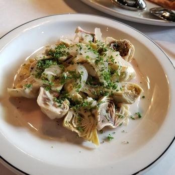 La Banane - Artichokes served with sea bass. - French Near Me - Toronto, Ontario La Banane - Artichokes served with sea bass. - French Near Me - Toronto, Ontario
