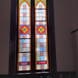 Events By Jess - Original stained glass windows in the deconsecrated Methodist church.