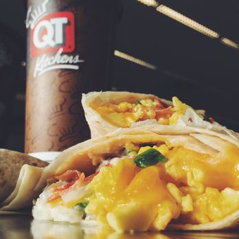 QuikTrip - a burrito and a drink on a table - Convenience Stores Near Me - Saginaw, Texas