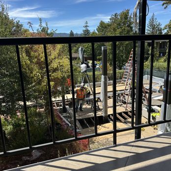 Sand Hill Sundeck - Current view from tables out on the deck. Imagine the sawing of those vertical metal beams throughout your entire meal. - Sandwiches Near Me - Menlo Park, California