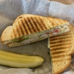 River House Soda Fountain, Cafe, and Antiques - #9 pesto Panini with a substitution of turkey and pepper Jack cheese for ham and provolone.