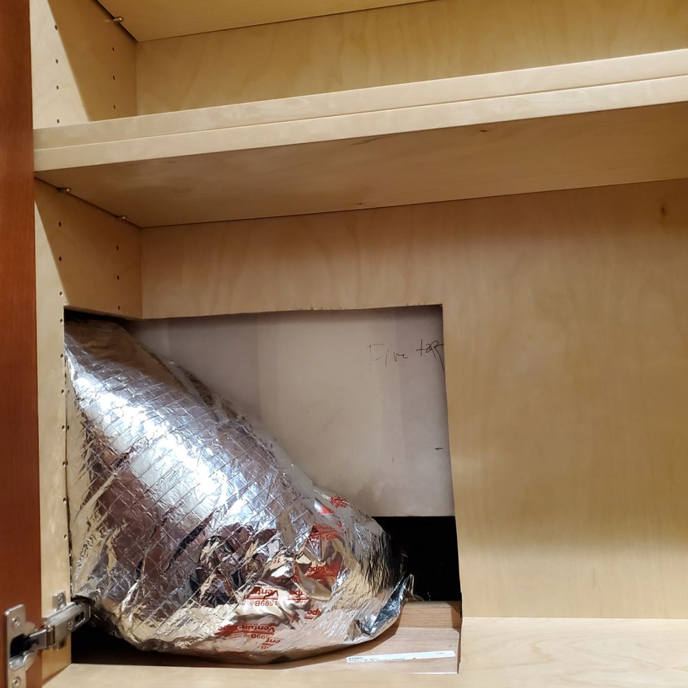AT6 Architecture + Design Build - Brand new cabinet totally destroyed to run a duct that was supposed to go behind the wall. The duct is totally crushed and delivers no air. - Architects Near Me - San Francisco, California AT6 Architecture + Design Build - Brand new cabinet totally destroyed to run a duct that was supposed to go behind the wall. The duct is totally crushed and delivers no air. - Architects Near Me - San Francisco, California
